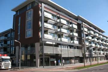 Nieuwbouw bibliotheek, 77 appartementen en parkeergarage